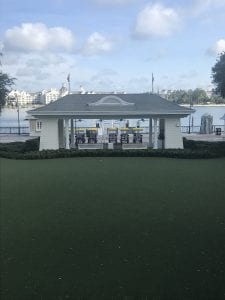 View of the Back of Disney’s Boardwalk Hotel. Grass and water